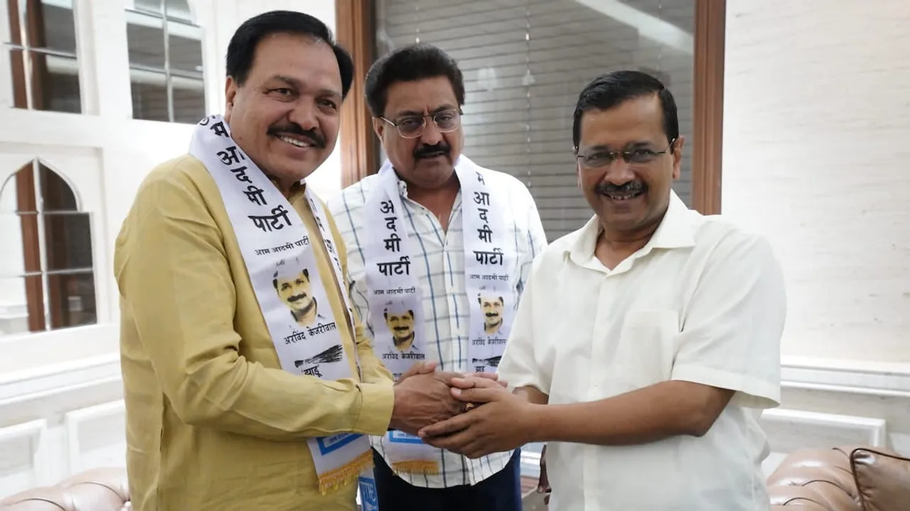 A file photo from April 22 when Vashram Sagathiya (Left) and Indranil Rajguru joined AAP and met Arvind Kejriwal