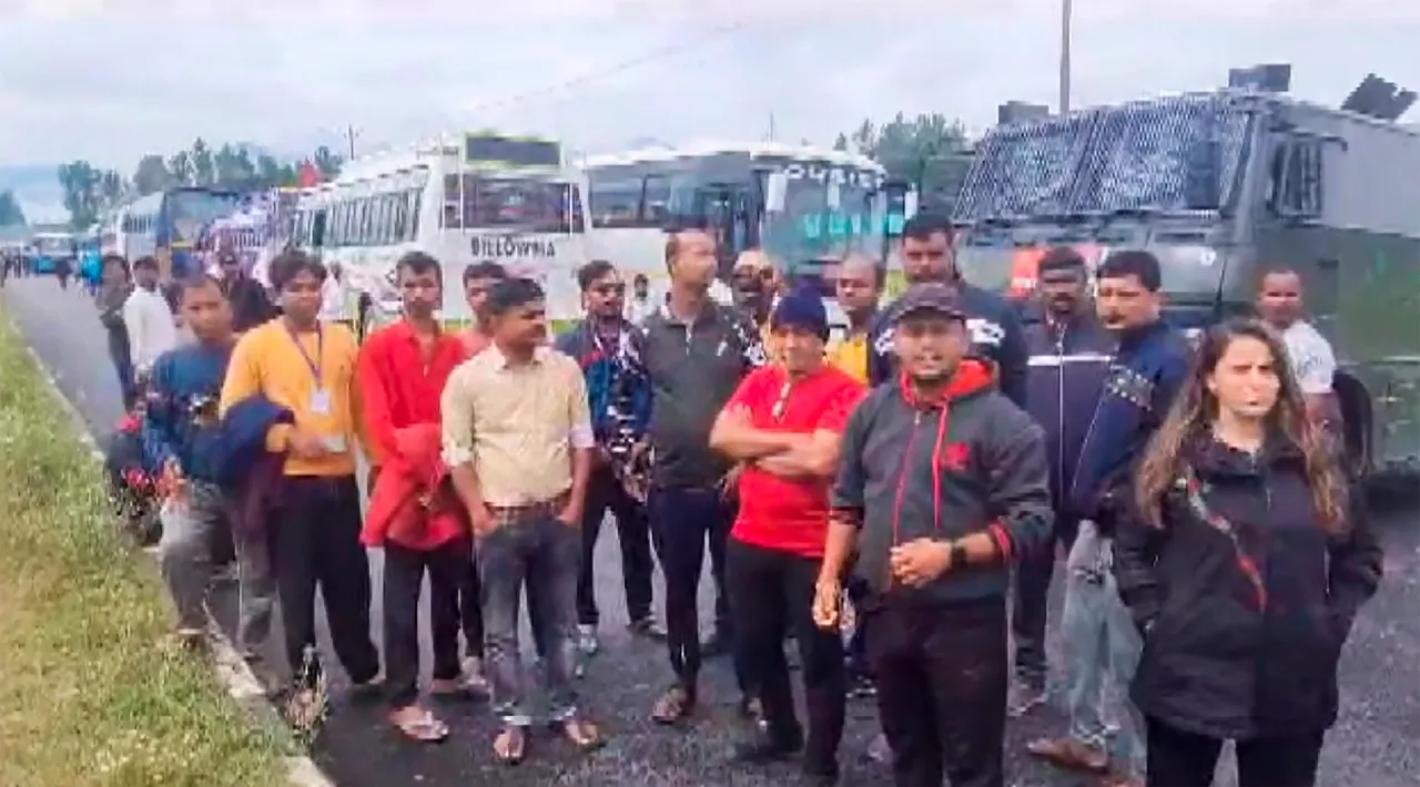 Pilgrims stranded after the Amarnath Yatra was temporarily suspended for third consecutive day due to bad weather, in Anantnag district