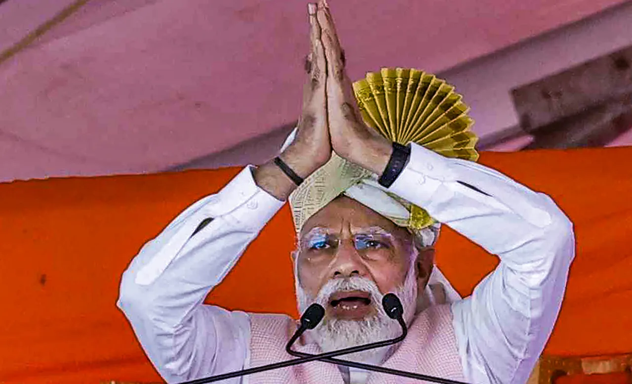 Prime Minister Narendra Modi addresses a public meeting in support of BJP candidates, ahead of Assembly polls in Bailhongal on May 3