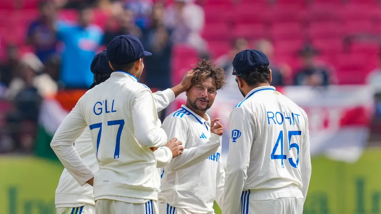 India's bowler Kuldeep Yadav celebrates the wicket of England's batter Zak Crawley during the first day of the fifth Test cricket match between India and England, in Dharamshala