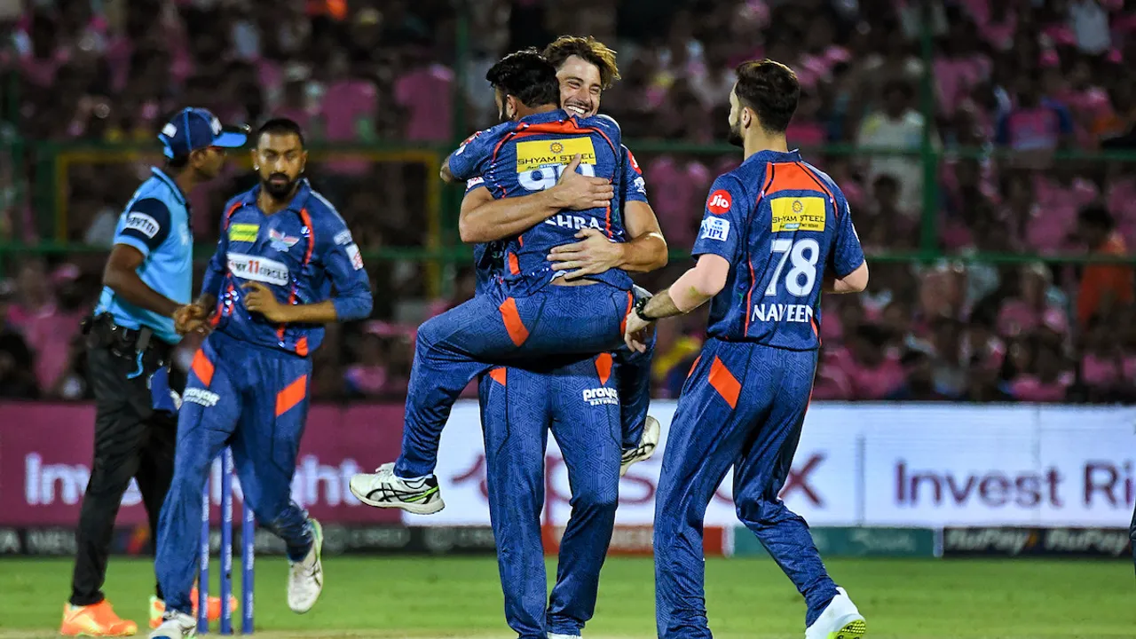 Lucknow Super Giants bowler Marcus Stoinis celebrates a wicket with teammates during the IPL 2023 cricket match against Rajasthan Royals at Sawai Mansingh Stadium, April 19