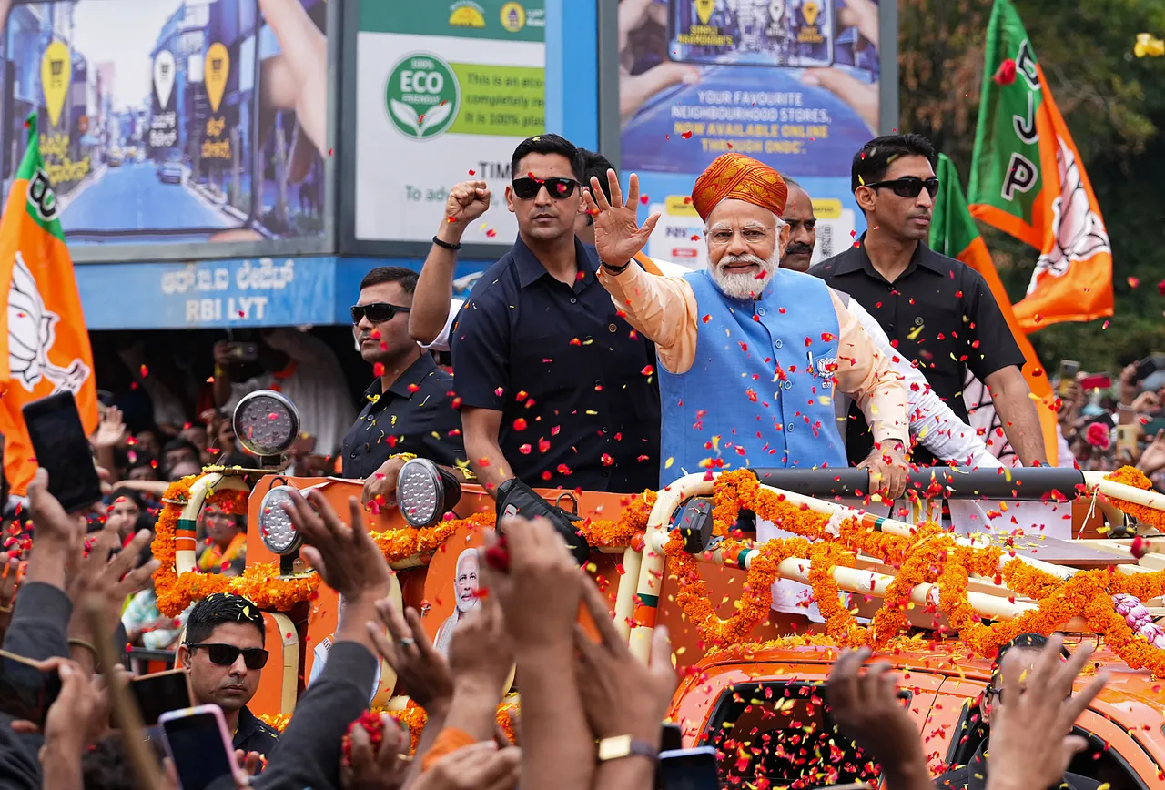 Prime Minister Narendra Modi during a roadshow ahead of Karnataka Assembly elections, in Bengaluru