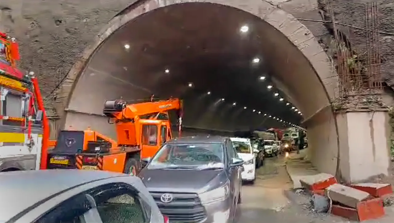 Vehicles stuck on Jammu-Srinagar National Highway after it got blocked due to landslides following rainfall, in Jammu & Kashmir