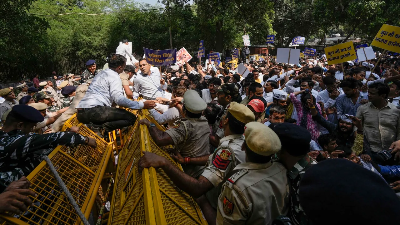 AAP workers protest against the arrest of party's MP Sanjay Singh by ED in Delhi excise policy case, at BJP headqarters in New Delhi