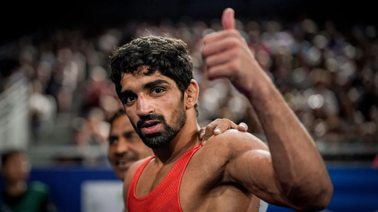 India's Aman after winning the men's freestyle 57kg wrestling quarterfinal match at the 2024 Summer Olympics, in Paris, France, Thursday, Aug. 8, 2024.