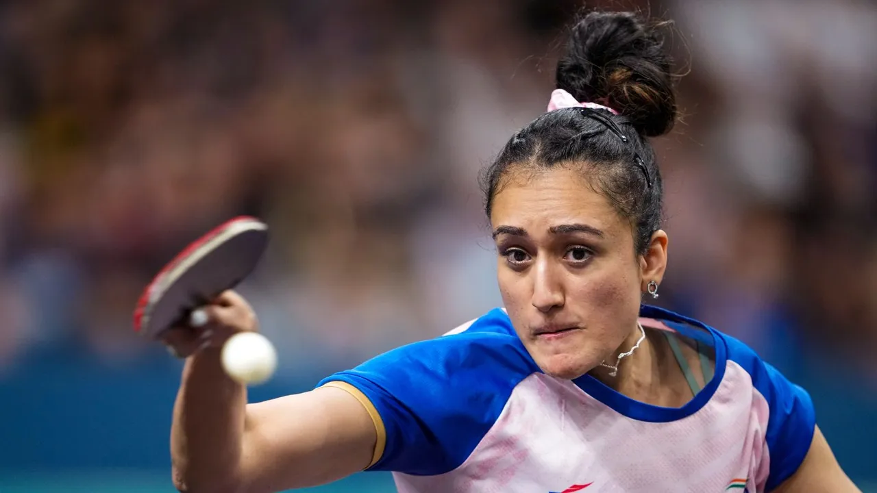 India's Manika Batra reacts after defeating France's Prithika Pavade in the women's singles round of 32 match at the Summer Olympics, in Paris, Monday, July 29, 2024.
