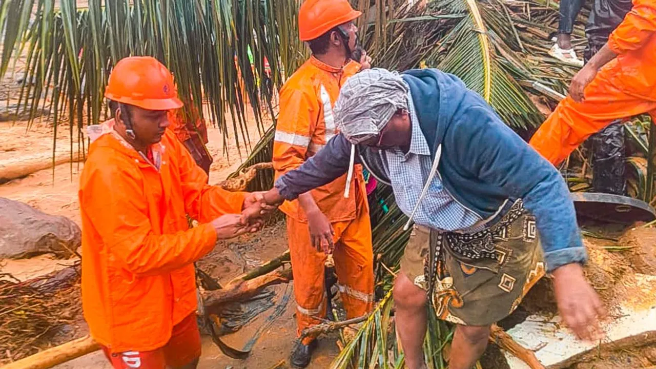 National Disaster Response Force (NDRF) personnel conduct rescue operation after huge landslides in the hilly areas near Meppadi, in Wayanad district, Kerala, Tuesday, July 30, 2024