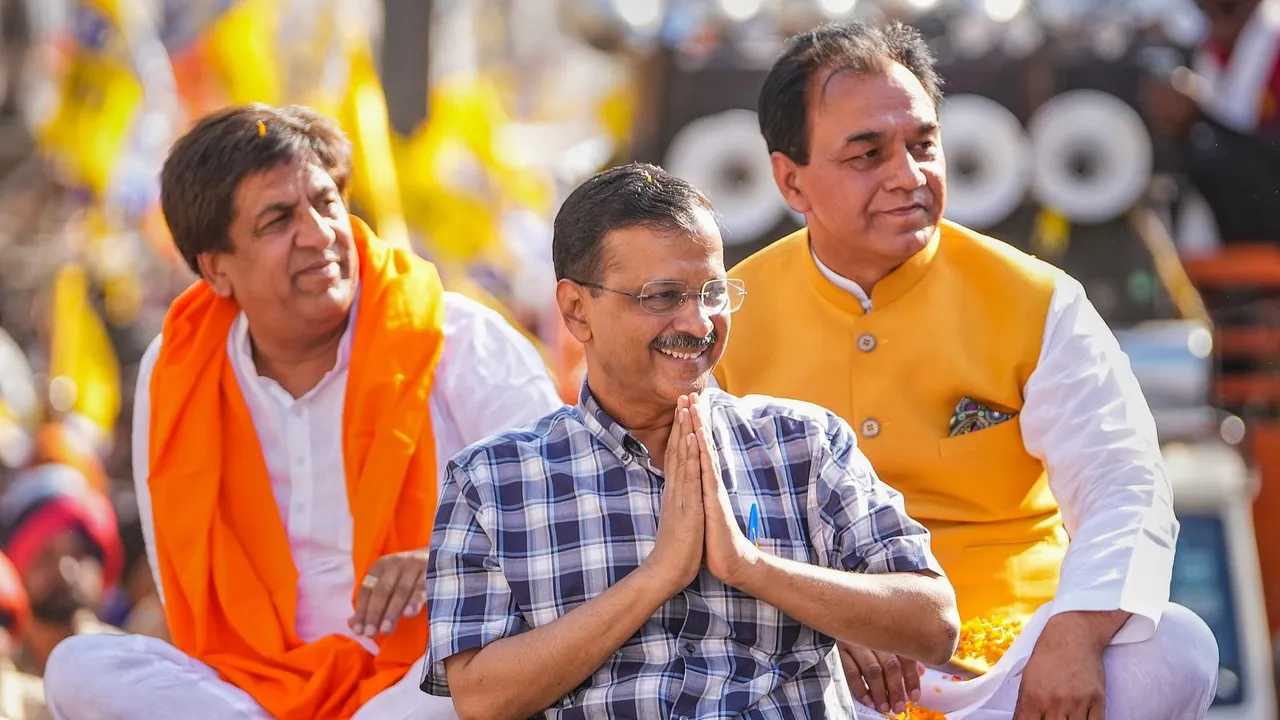 Delhi Chief Minister and AAP convenor Arvind Kejriwal during a roadshow in favour of AAP candidate Rajkumar Chabbewal for Lok Sabha elections, in Hoshiarpur, Sunday, May 26, 2024