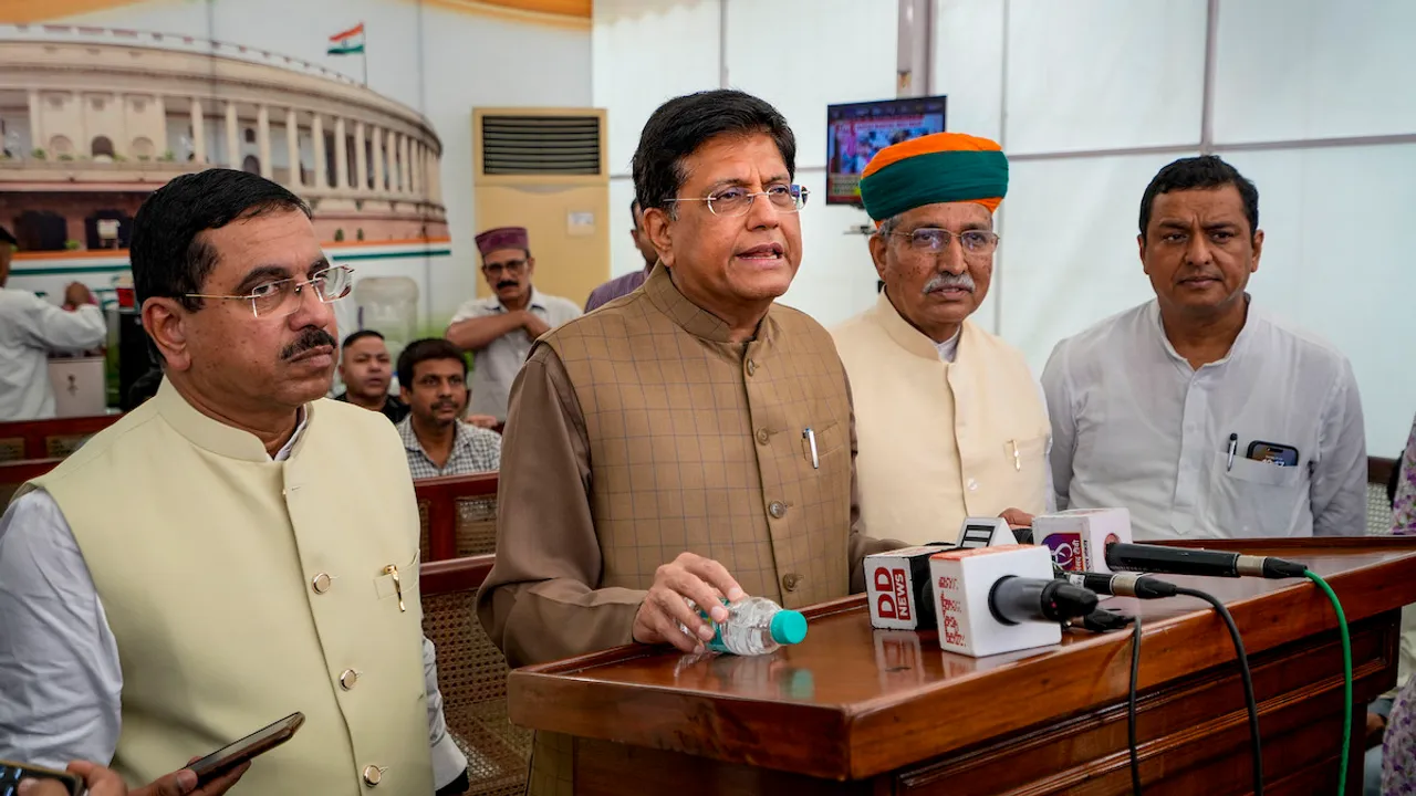 Piyush Goyal with Union Ministers Arjun Ram Meghwal and Pralhad Joshi addresses the media on the first day of the Monsoon session of Parliament, in New Delhi, Thursday, July 20