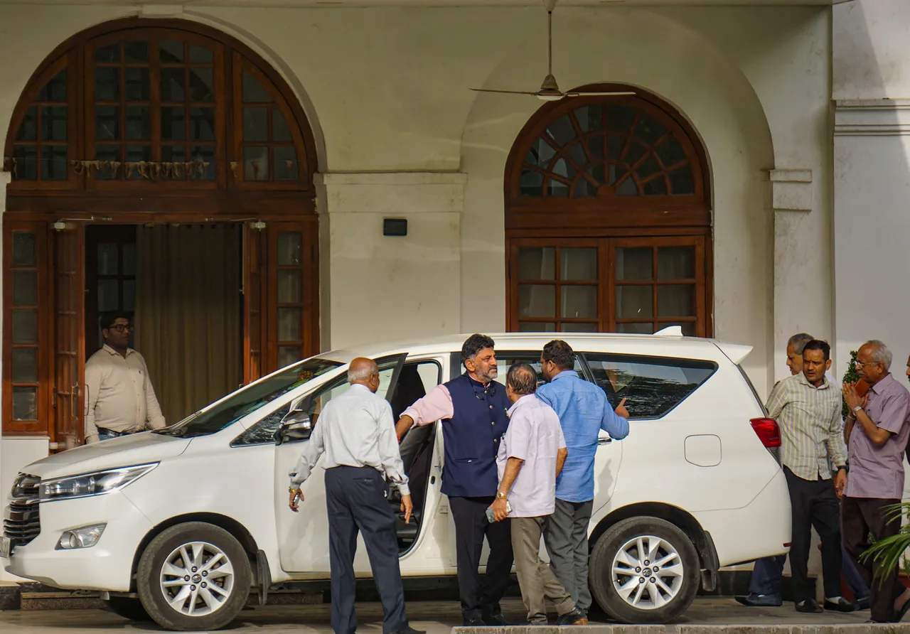 Karnataka Congress President DK Shivakumar arrives at the residence of the party's President Mallikarjun Kharge, in New Delhi