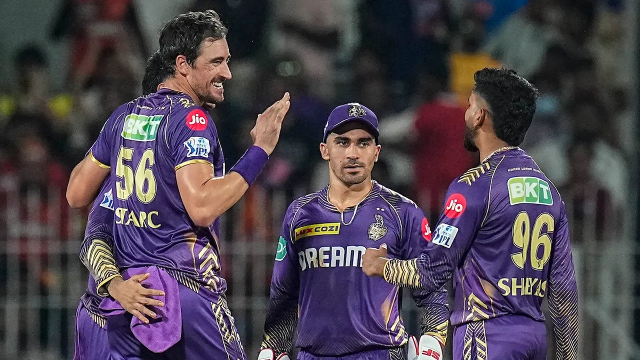 Kolkata Knight Riders' Mitchell Starc with teammates celebrates after taking the wicket of Sunrisers Hyderabad batter Abhishek Sharma during the Indian Premier League (IPL) 2024 final cricket match between Sunrisers Hyderabad and Kolkata Knight Riders at MA Chidambaram Stadium, in Chennai, Sunday, May 26, 2024.
