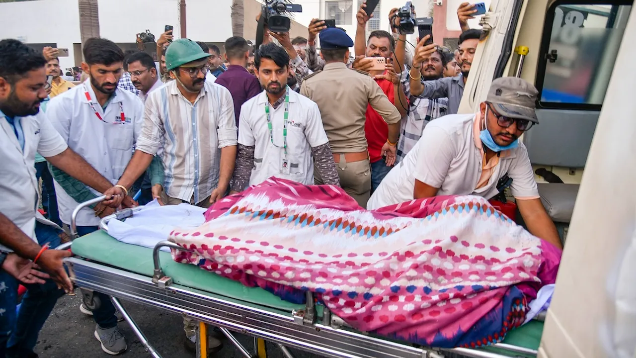 Injured being shifted to a hospital after a fire broke out in a gaming zone, in Rajkot, Saturday, May 25, 2024.