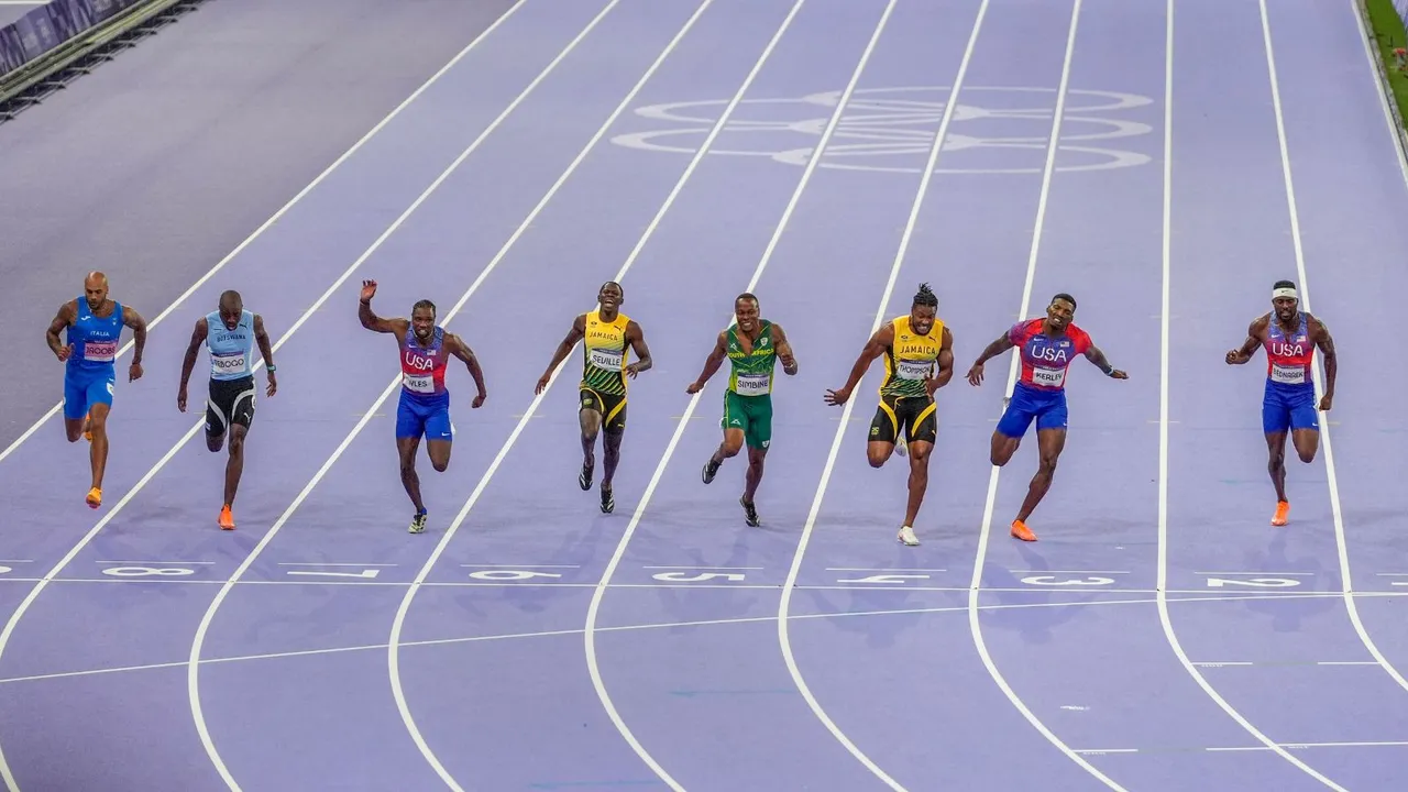 Noah Lyles (2nd L) of the United States crosses the finish line to win win the gold medal in the men's 100 meters final at the 2024 Summer Olympics, in Saint-Denis, France, Sunday, Aug. 4, 2024.