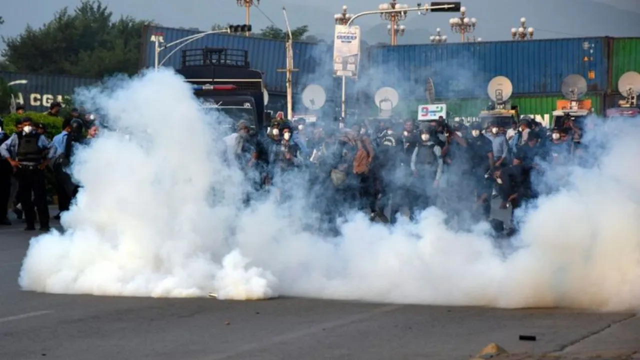 Police fire tear gas shells to disperse the supporters of imprisoned former Prime Minister Imran Khans party Pakistan Tehreek-e-Insaf during a protest in Islamabad, Pakistan