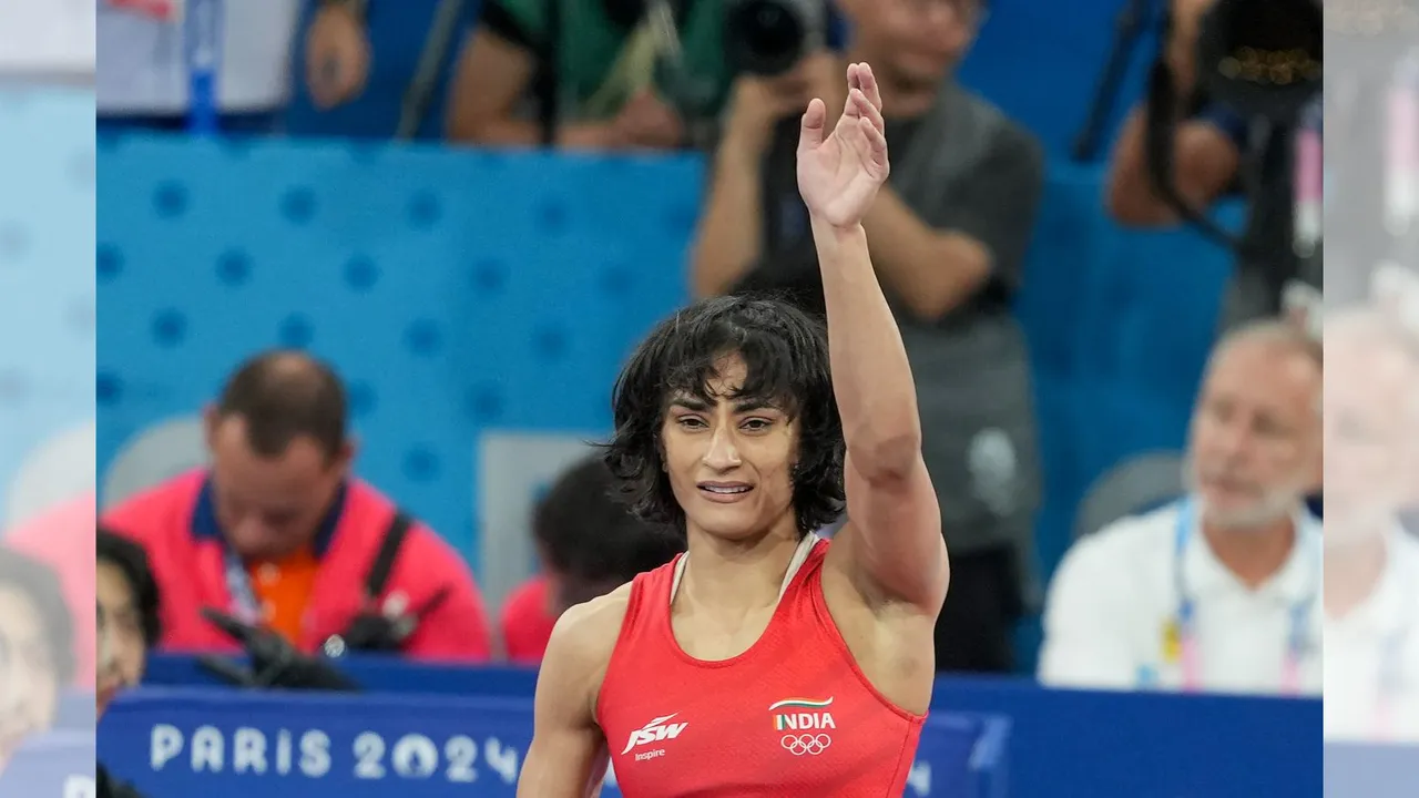 India's Vinesh Phogat celebrates after winning her Women's Freestyle 50kg semi-final wrestling match against Cuba's Yusneylys Guzman Lopez at the 2024 Summer Olympics, in Paris, France, Tuesday, Aug. 6, 2024.