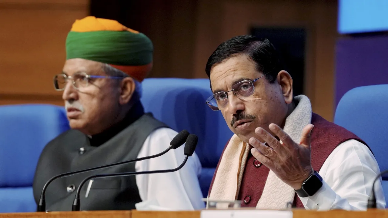 Union Minister for Parliamentary Affairs Pralhad Joshi speaks during a press conference, in New Delhi