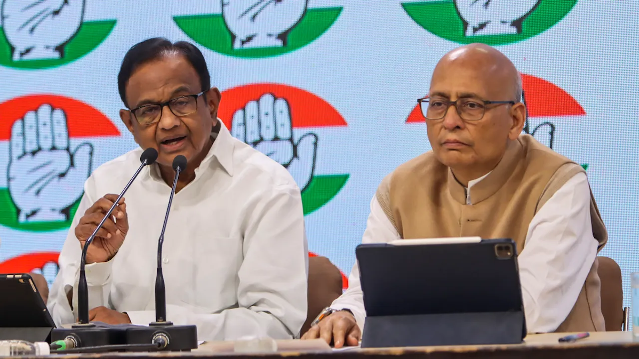 Congress leaders P Chidambaram and Abhishek Manu Singhvi during a press conference, at party office in New Delhi, Monday, Dec. 11, 2023.