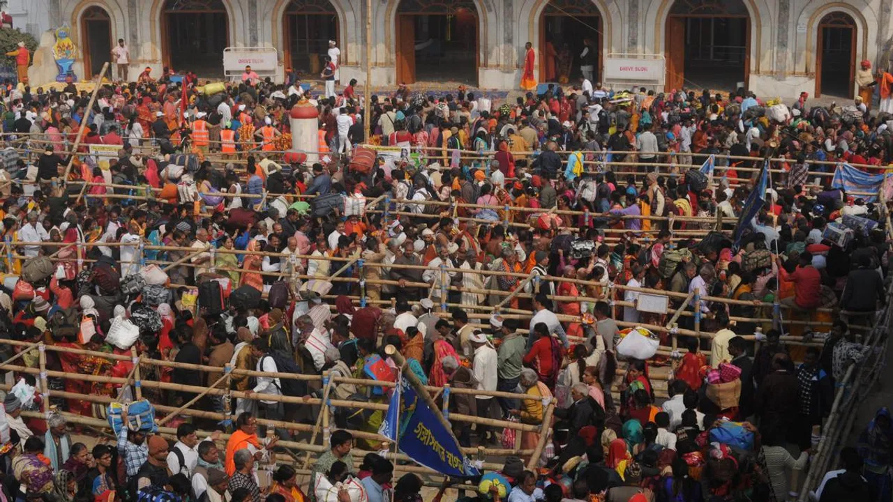 Devotees taking holy dip at Gangasagar the confluence of River Ganga and Bay of Bengal on the occasion of Makar Sankranti