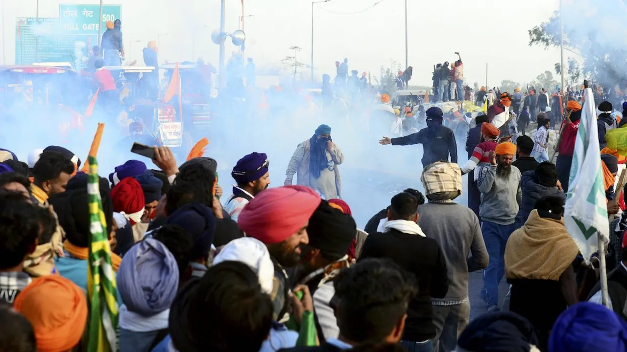 Police fire tear gas to disperse farmers during their 'Delhi Chalo' march, near the Punjab-Haryana Shambhu border, in Patiala district, Wednesday, Feb. 21, 2024. Farmers protesting at the Punjab-Haryana border resumed their march on Wednesday, days after the fourth round of talks with the government over their demands.