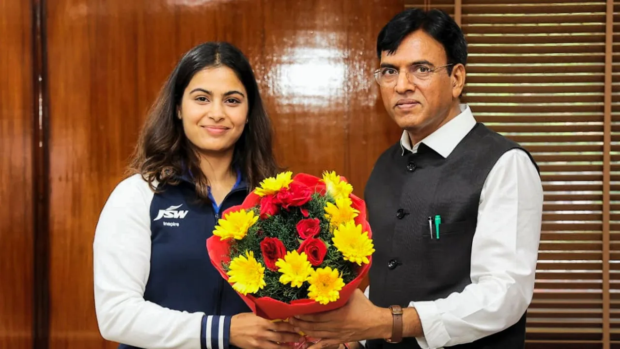 Olympic medalist Manu Bhaker being greeted by Union Minister for Youth Affairs and Sports Mansukh Mandaviya during a meeting, in New Delhi.