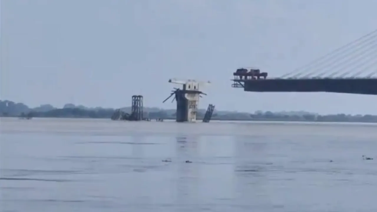A superstructure of Pillar number 9 of the under-construction Sultanganj-Aguwani Ghat bridge collapses