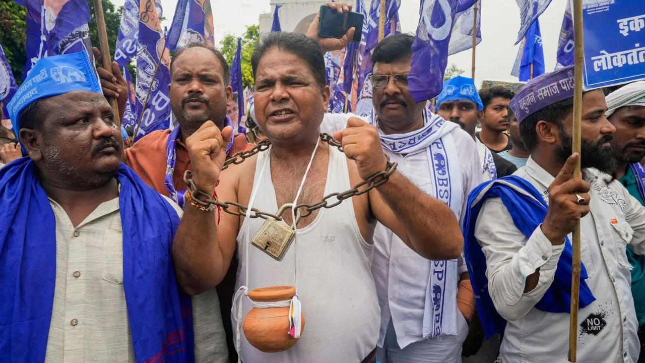 BSP workers protest against the Supreme Court's August 1 decision on the issue of SC-ST reservation during Bharat Bandh, at the Ambedkar Statue at Hazratganj, in Lucknow, Wednesday, Aug. 21, 2024.