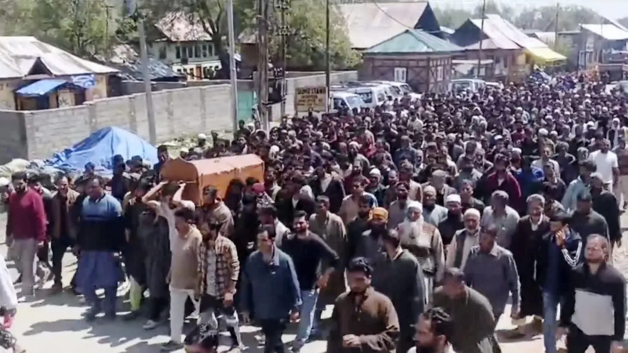 People during the last rites of former Sarpanch Aijaz Ahmed Sheikh who was killed in a firing by terrorist, in Pulwama, Sunday, May 19, 2024