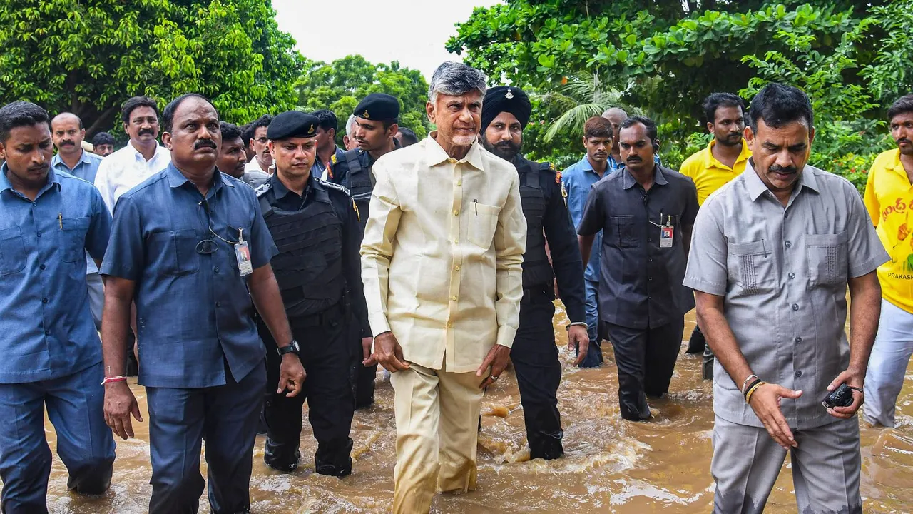 Andhra Pradesh Chief Minister Chandrababu Naidu during his visit to the flood affected areas. Naidu visited Krishna Lanka and Jakkampudi areas.
