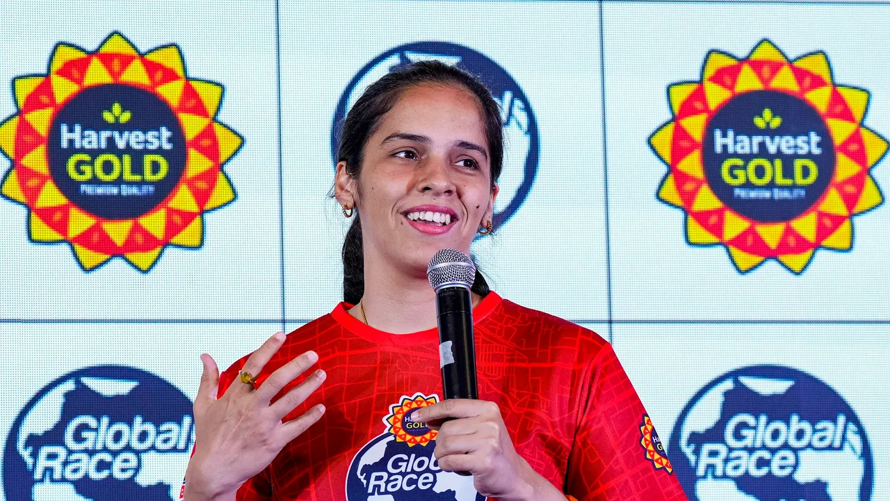 Badminton player and Harvest Gold Race 2003 ambassador Saina Nehwal speaks during unveiling of the race jersey at a press conference of , in New Delhi