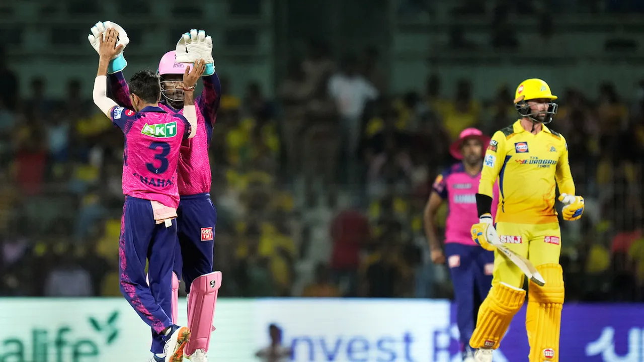 Rajasthan Royals bowler Yuzvendra Chahal celebrates with teammate the wicket of Chennai Super Kings batter Devon Conway at Chidambaram Stadium on April 12
