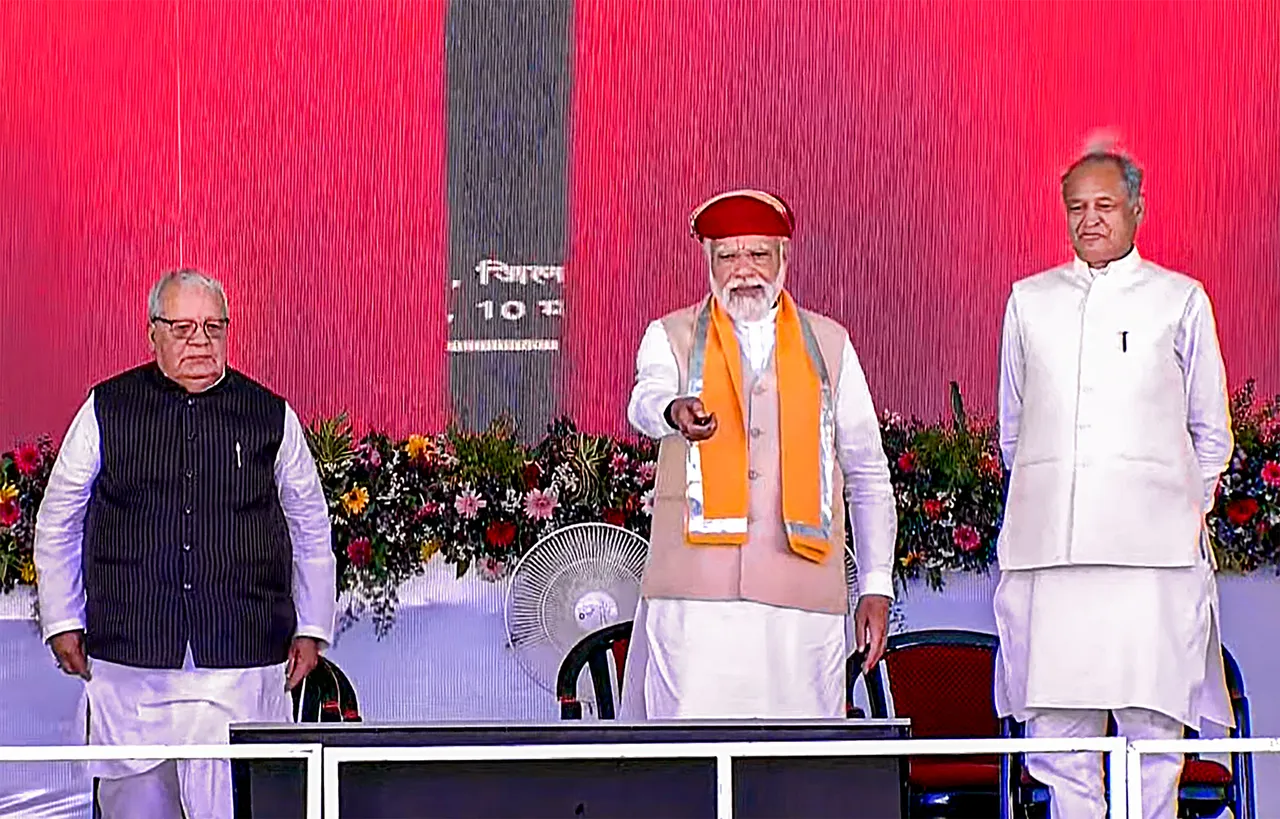Prime Minister Narendra Modi with Rajasthan Governor Kalraj Mishra and Chief Minister Ashok Gehlot during a programme to lay foundation stone and dedicate various projects, in Nathdwara
