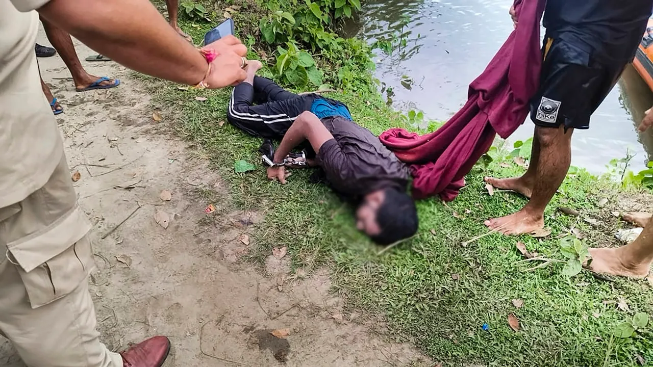 Body of prime accused in the alleged rape of a minor girl after being recovered from a pond, at Dhing, in Nagaon district, Saturday, Aug. 24, 2024
