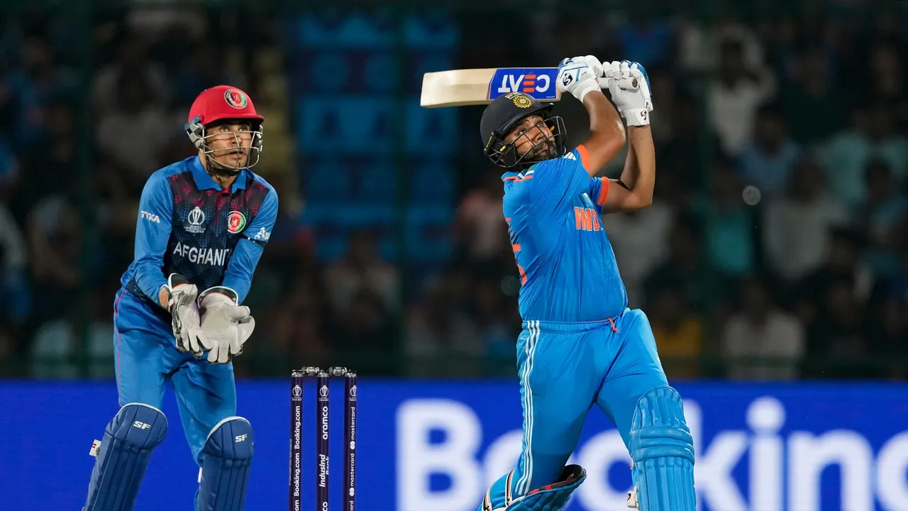 India's captain Rohit Sharma plays a shot during the ICC Men's Cricket World Cup 2023 match between India and Afghanistan, at Arun Jaitley Stadium