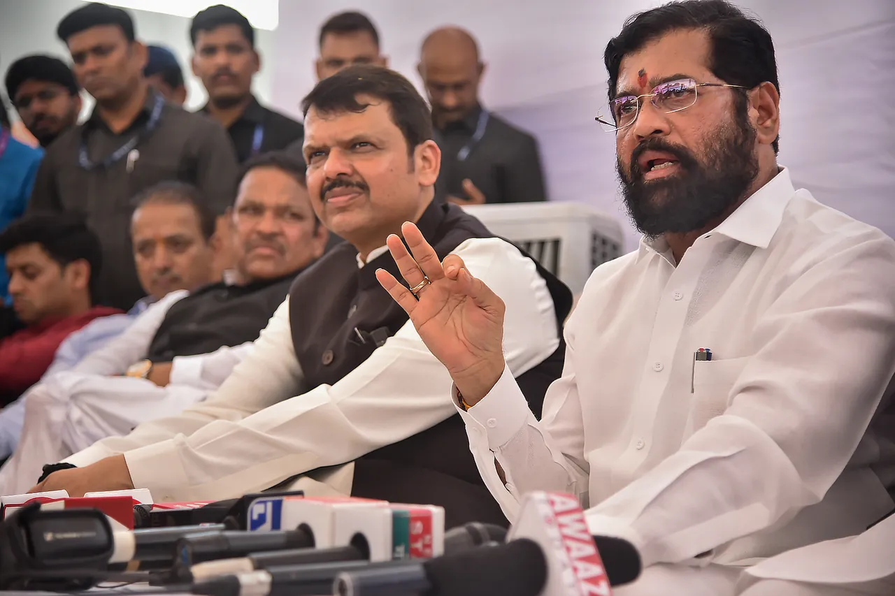Maharashtra Chief Minister Eknath Shinde with Deputy Chief Minister Devendra Fadnavis interacts with media during his visit to Navi Mumbai International Airport, in Mumbai