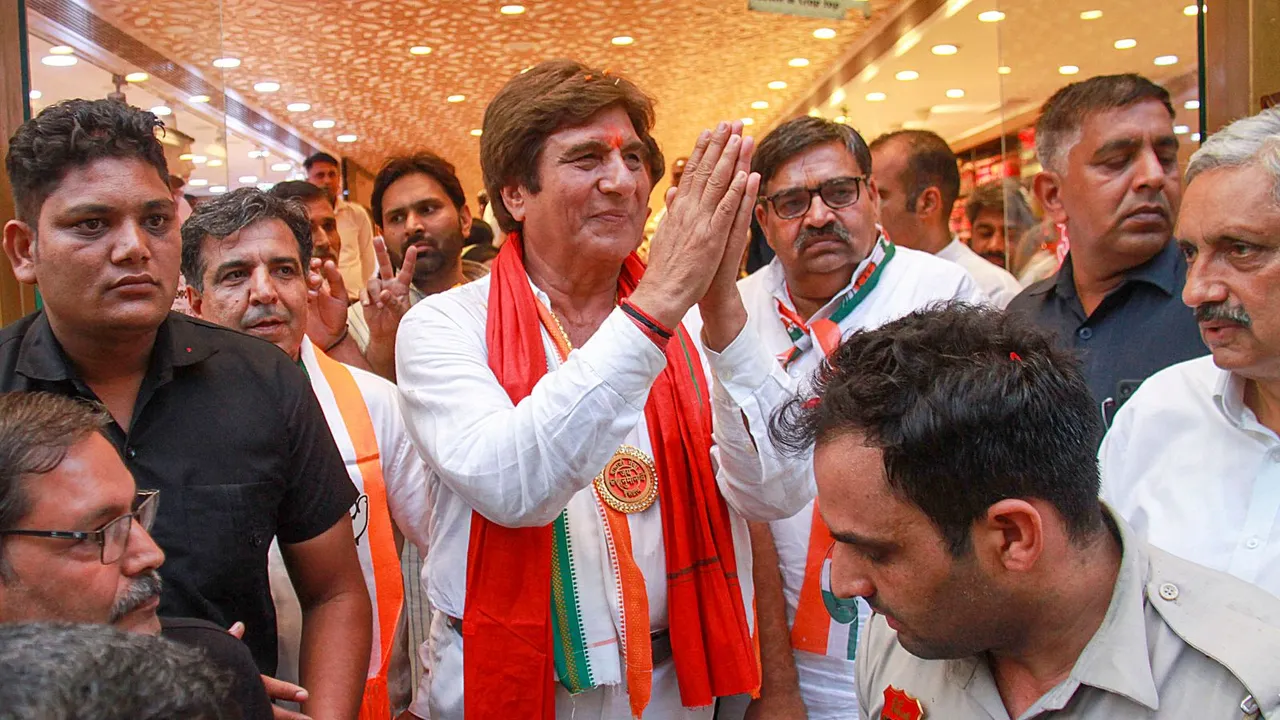 Congress candidate from Gurugram constituency Raj Babbar during a door-to-door campaign for Lok Sabha elections, at Sadar Bazaar Market, in Gurugram, Tuesday, May 14, 2024