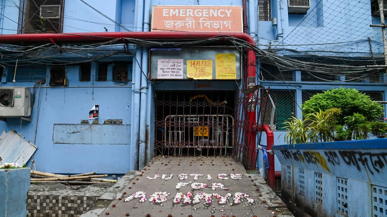 'Justice For Abhaya' is written with floweres in front of the emergency building at RG Kar Medical College and Hospital as junior doctors cease work against the alleged rape and murder of a trainee doctor, in Kolkata, Monday, Sept. 8, 2024.