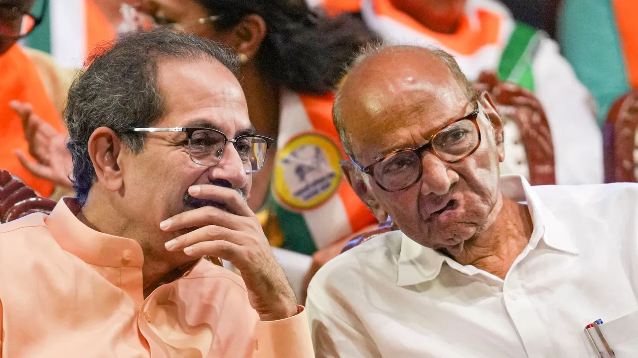 Shiv Sena (UBT) chief Uddhav Thackeray and NCP (SP) chief Sharad Pawar during the gathering of Maha Vikas Aghadi (MVA) workers and office-bearers ahead of Maharashtra Assembly elections, in Mumbai, Friday, Aug. 16, 2024.