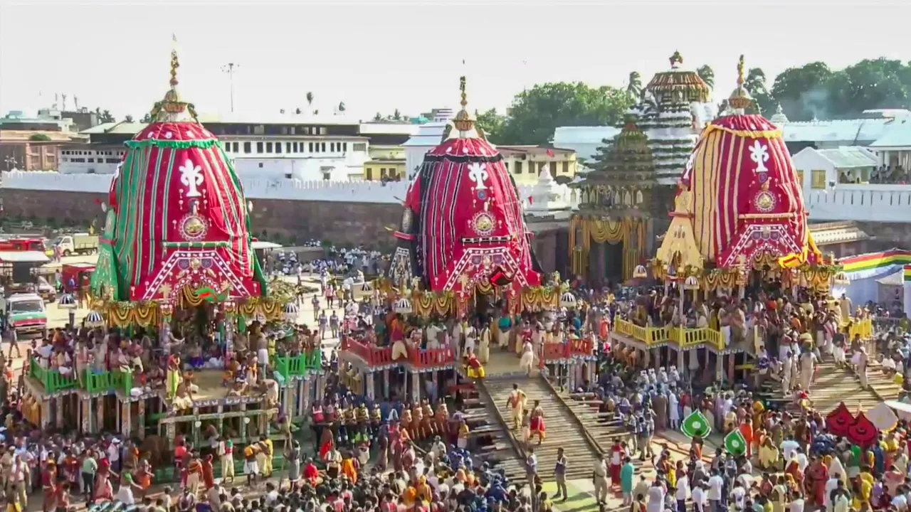Devotees gather around the chariots of Lord Jagannath, Lord Balabhadra and Goddess Subhadra during the annual Rath Yatra, in Puri.