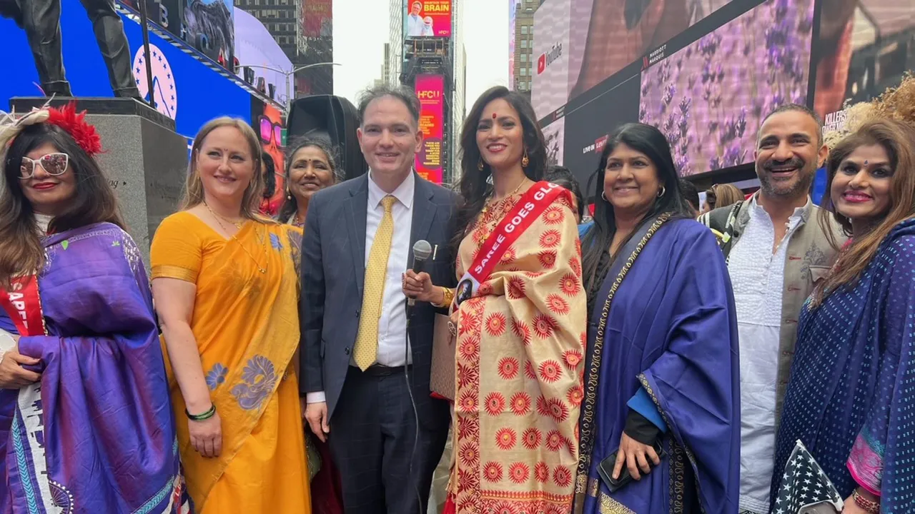 Members of the Indian-American community with others during 'Saree Goes Global' event at Times Square, in New York