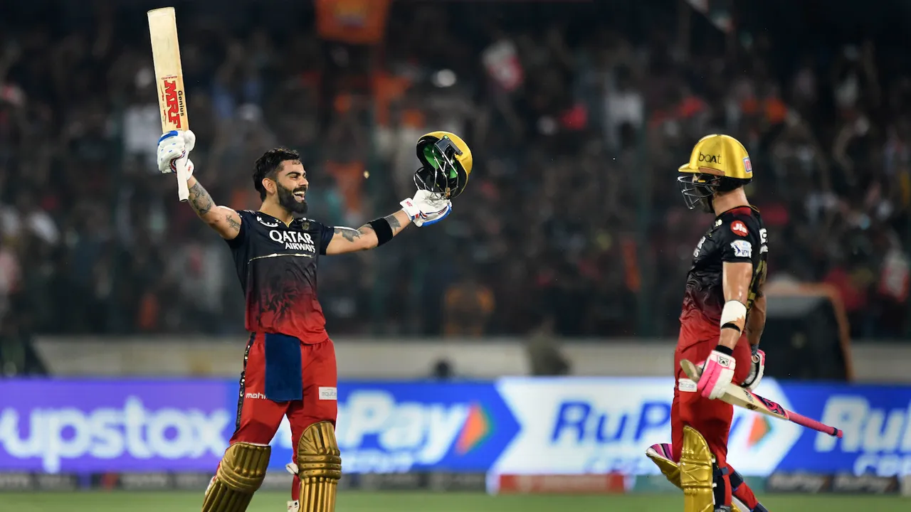 Virat Kohli celebrates his century during the IPL 2023 cricket match between Sunrisers Hyderabad and Royal Challengers Bangalore at Rajiv Gandhi International Cricket Stadium on May 18