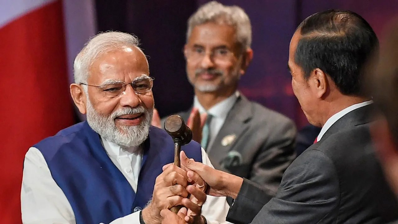 President of Indonesia Joko Widodo symbolically hands over the G20 Presidency to Prime Minister Narendra Modi in Bali