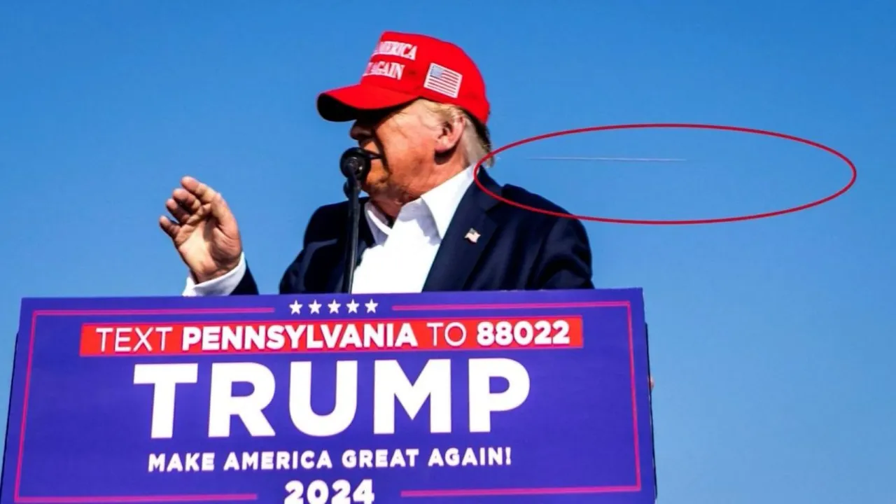 Image of Donald Trump being hit by a bullet in an assassination bid, captured by Pulitzer Prize winning photographer Doug Mills