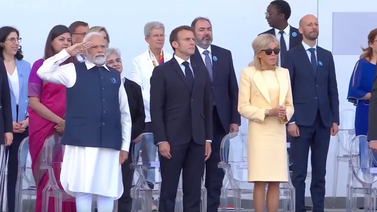 Narendra Modi pays salute during Bastille Day Parade in Paris