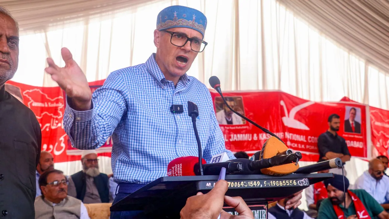 Jammu and Kashmir National Conference (JKNC) Vice President and party candidate from Baramulla constituency Omar Abdullah being greeted by a party worker during an election rally at Magam for the Lok Sabha polls, in Budgam district, Saturday, May 18, 2024