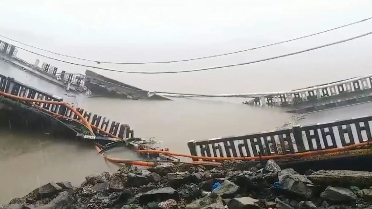 The bridge across the Kali River collapses near Karwar in Uttara Kannada district, Wednesday, Aug. 7, 2024.