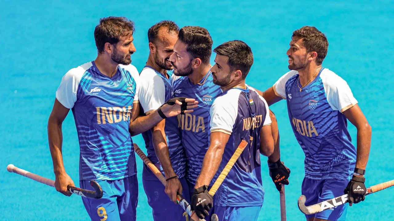 India's captain Harmanpreet Singh celebrates with teammates after scoring a goal during the Pool B hockey match between India and Ireland at the 2024 Summer Olympics, in Paris, France, Tuesday, July 30, 2024.