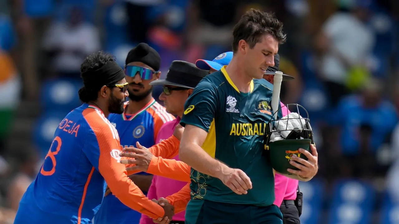Pat Cummins walks off the field after Australia lost to India by 24 runs in the Super 8 match