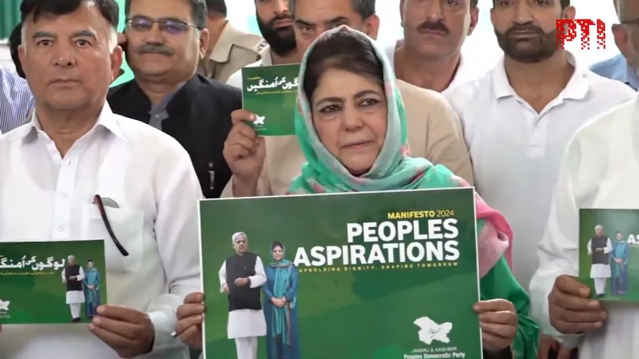 Former Jammu and Kashmir CM and PDP supremo Mehbooba Mufti along with other PDP leaders, releases her party manifesto in Srinagar