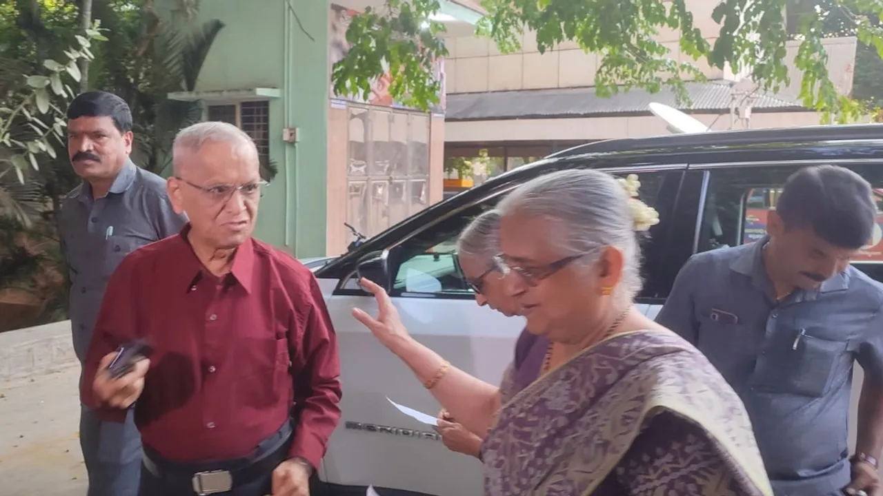 Infosys founder NR Narayana Murthy and Rajya Sabha MP Sudha Murty arrive at the polling station in Jaya Nagar, Bengaluru