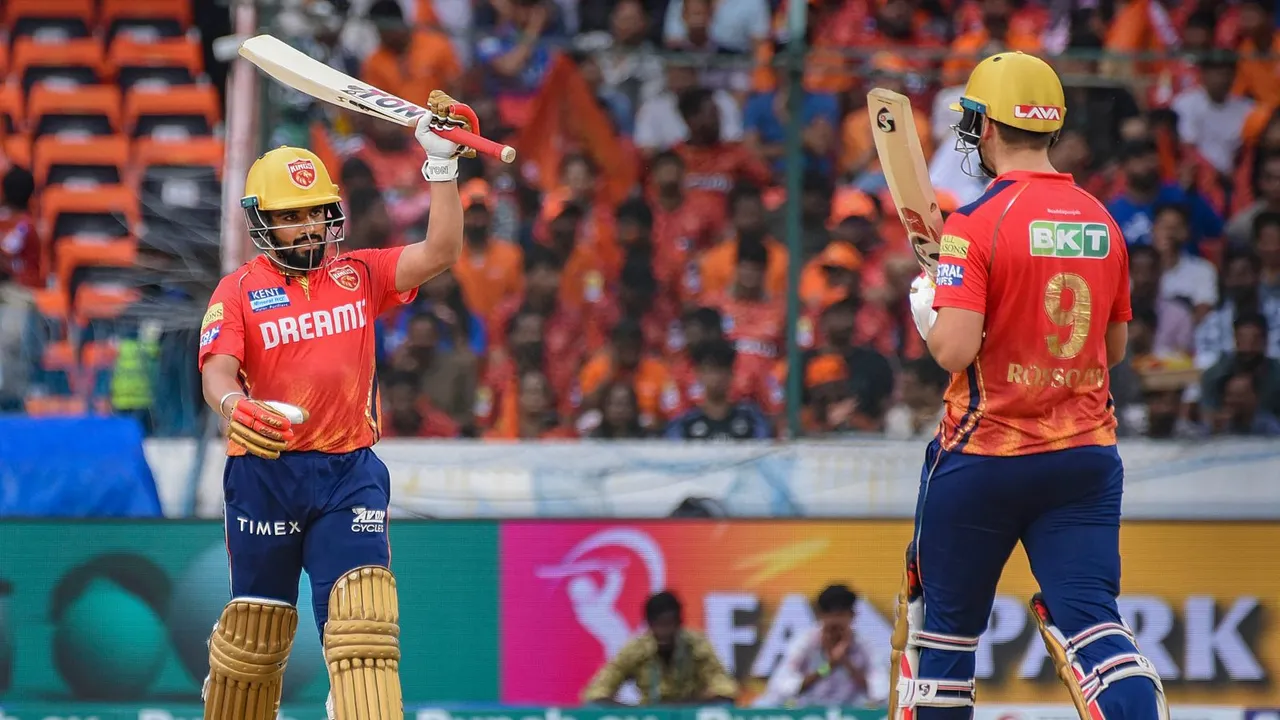 Punjab Kings' Prabhsimran Singh celebrates his half-century with Rilee Rossouw during an Indian Premier League (IPL) 2024 T20 cricket match